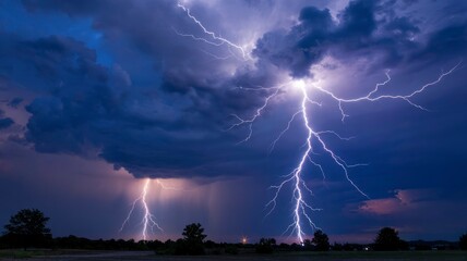 Dramatic Lightning Strike Over Rural Landscape at Night