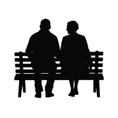 elderly couple holding hands silhouette on a bench