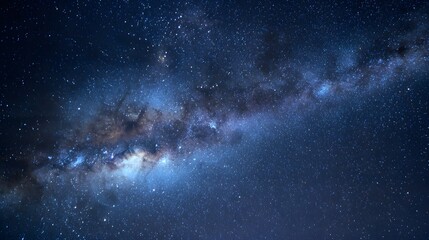 Fototapeta premium Stunning view of the night sky filled with stars and the milky way.