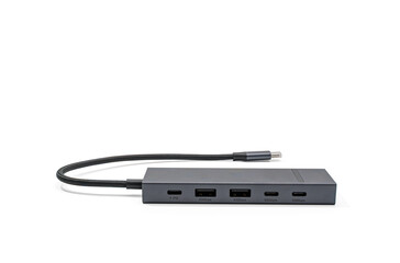 Modern USB-C hub with four visible ports labeled with speed and power delivery. Clean, minimal design on a white background.