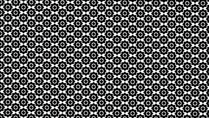 Monochrome background featuring a dense pattern of alternating floral and diamond shapes in black and white