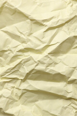 Obraz premium Crumpled yellow paper background texture