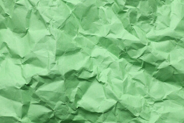 Crumpled green paper background texture