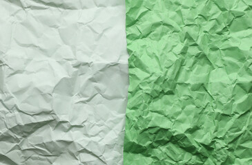 Two-tone crumpled colored paper sheets. Background for design. Texture