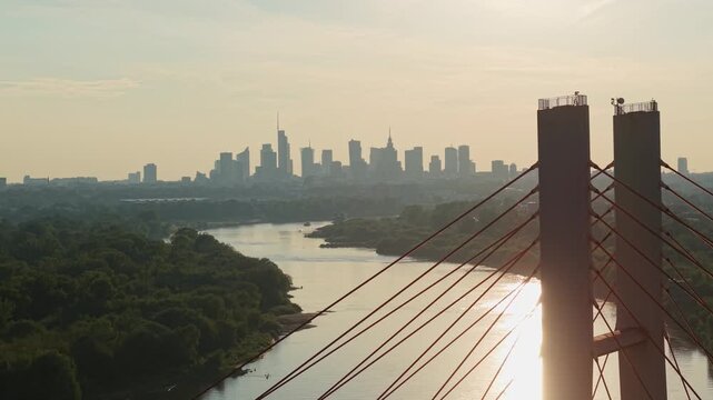View of modern skyscrapers and business center in Warsaw, Poland. Vistula River and center district of Warsaw at sunset. View of the city from the side of Siekierki (Siekierkowski) bridge.