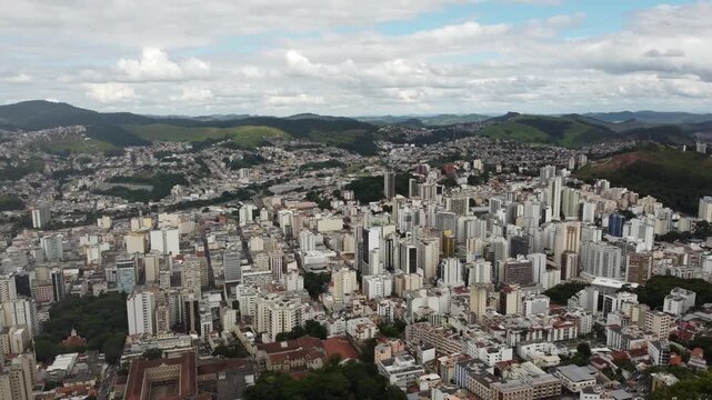 MIRANTE DO MORRO DO CRISTO, JUIZ DE FORA, MINAS GERAIS, BRAZIL - DECEMBER 20, 2021: Drone view of the Juiz de Fora from the highest lookout in the city.