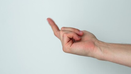 A beckoning hand gesture close-up on a white background.
A man is calling to come with him and follow him.
Come with me hand signal