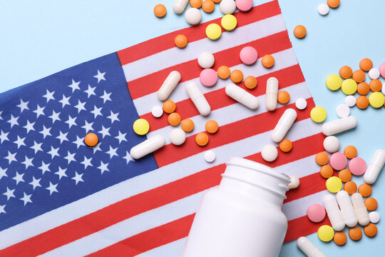 USA flag and pills. Concept of health care