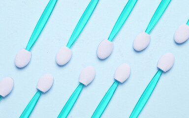 Set of applicators for makeup on a blue background