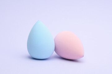 Make-up sponges, cosmetic blenders on white background. Beauty products.