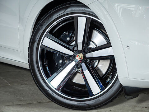Novosibirsk, Russia -  July 14, 2025: Porsche Cayenne,  close-up of the bumper, alloy wheel, car detailing, wheel