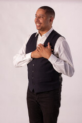 Adult male wearing elegant blazer, matching formal wear in studio shot with white background and making various facial expressions of mixed feelings