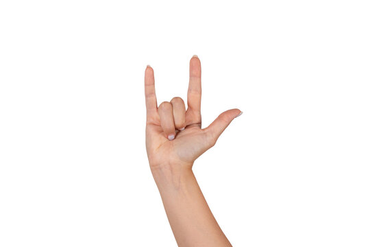 Caucasian woman's hand making the "sign of the horns" gesture, isolated on white background