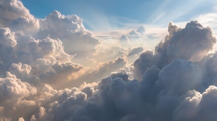 A vast expanse of cumulus clouds illuminated by sunlight.