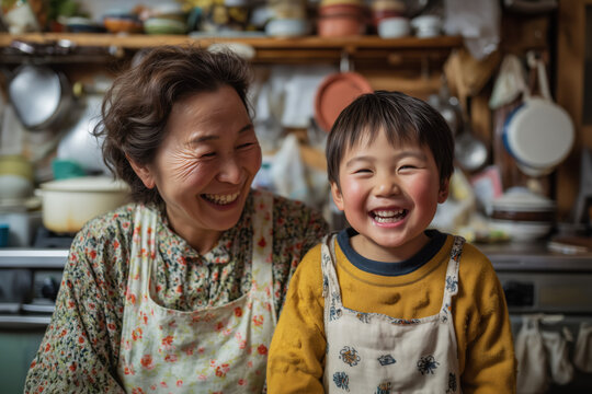Grandmother and grandson cooking in rustic kitchen.