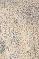 Close-up of a weathered concrete road surface