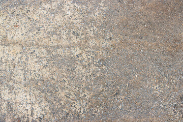 Close-up of a weathered concrete road surface
