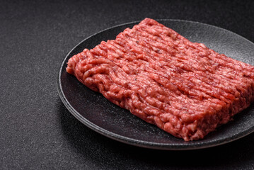 Raw ground beef meat food, ingredient for making cutlets or meatballs. Raw ground beef