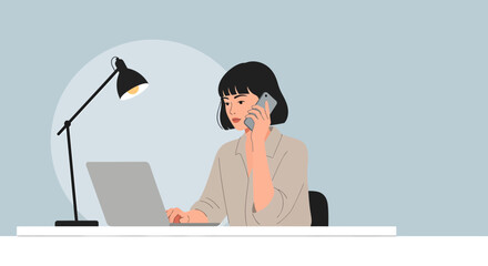 Woman with Short Black Hair Working on Laptop While Talking on Phone.