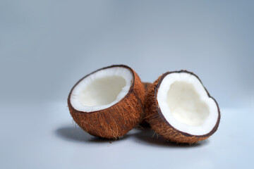 half coconuts on light gray background