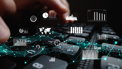 A close-up view of hands typing on a keyboard with digital data visualization elements like graphs and charts overlaying, symbolizing modern business analytics and intelligence. Xenic