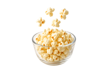 Bowl of popcorn with kernels popping out isolated on transparent background