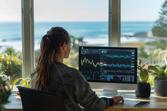Young woman working with diagram using laptop. Financial operations, algorithmic futures trading. Analysis of the stock market. Financial analytics, freelancing. Female at home.