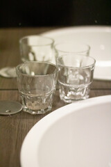 Empty Glass Tumblers on Wooden Table