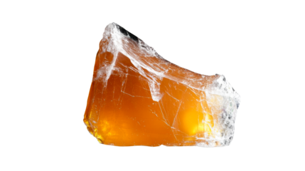 Vibrant amber stone with transparent qualities against clear backdrop