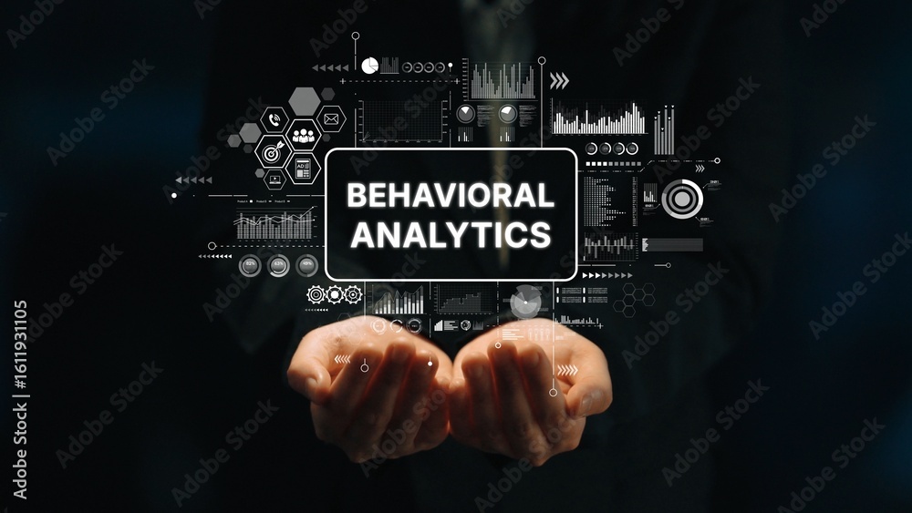 Poster hands holding conceptual display of behavioral analytics with data visualization elements in a dark 