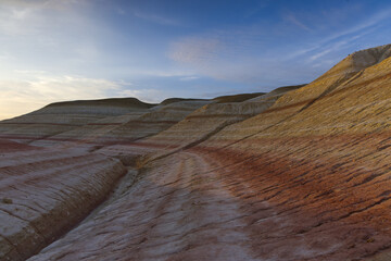 The colors of Tiramisu Canyon in Mangystau at sunrise, Kazakhstan