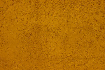 Abstract background made of orange plaster.