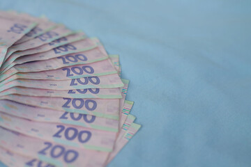 money cash close up on blue background