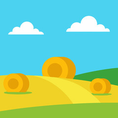 landscape with hay bales and blue sky