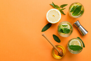 Caipirinha, Mojito cocktail, vodka or soda drink with lime, mint and straw on table background....