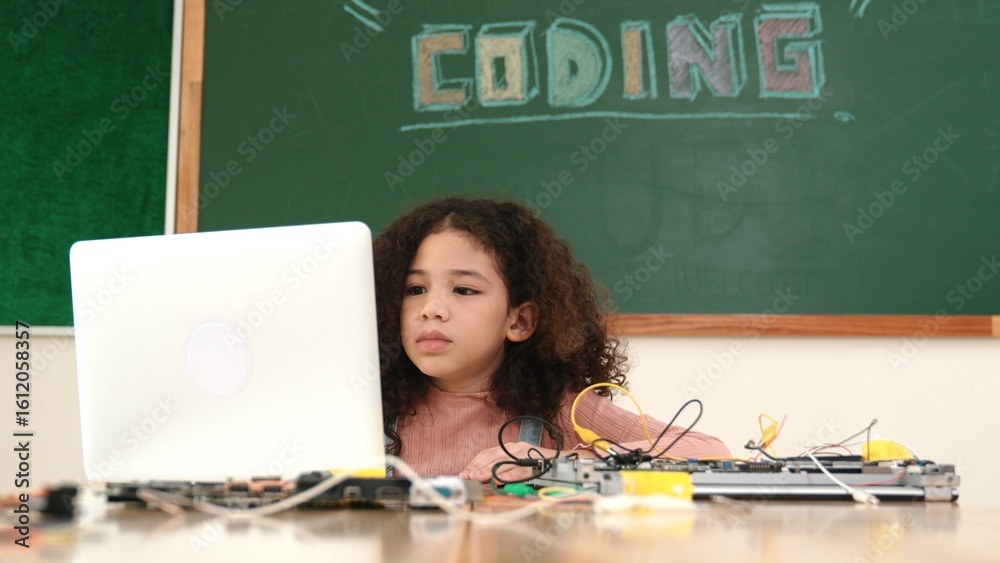 Poster attractive african student programing system while looking at screen. american girl working on her l
