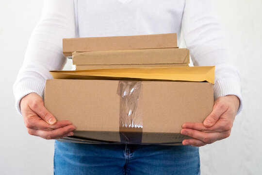 wpman holding a postal pakage