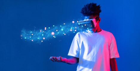 Fototapeta premium A young individual engages with virtual reality, showcasing the intersection of technology and social media. Colorful lights and digital elements enhance the immersive experience. XDMCP