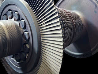 Detailed close-up of industrial steam turbine rotor and blades used in power generation. Ideal for: energy infrastructure, mechanical engineering, industrial design, and equipment manufacturing.