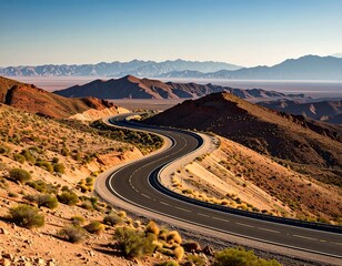 Winding road through desert mountains