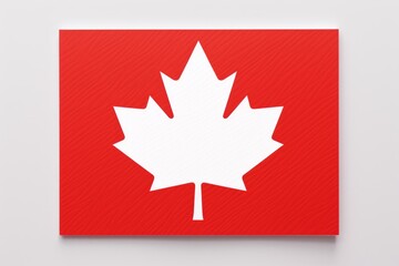 Obraz premium Close up view of canadian flag, featuring iconic white maple leaf centered on vibrant red background, representing national pride and cultural heritage