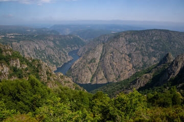 Scenic viewpoint Cabezo&aacute;s overlooking the Sil Canyon, Ribeira Sacra, Ourense, Galicia. Stunning river gorge, lush landscapes, and dramatic cliffs in northwest Spain.