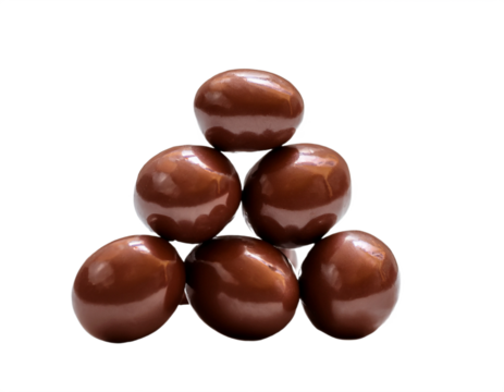 Indulgent chocolate spheres stacked in tempting pyramid formation for confectionery delight