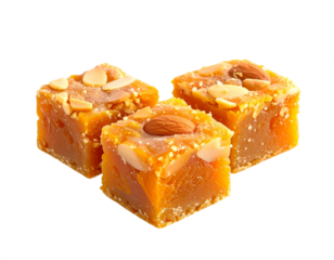 Delicious Indian sweet barfi topped with almonds and pistachios, a delightful treat