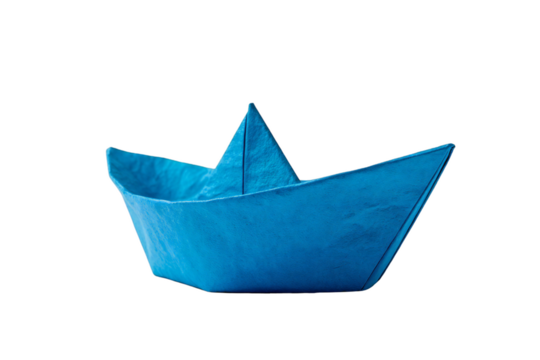 Photo of a vibrant blue origami paper boat, meticulously folded, floats on an imaginary sea, isolated against a pure transparent background