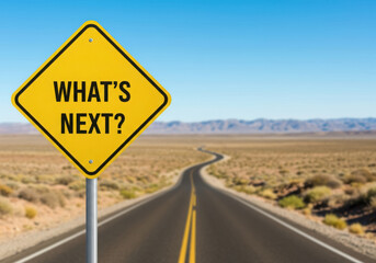 Whats next road sign on a desert highway under a clear blue sky