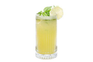 Lemonade in crystal glass on white background - Fresh homemade lemonade in clear crystal cup - Citrus summer drink in decorative glass
