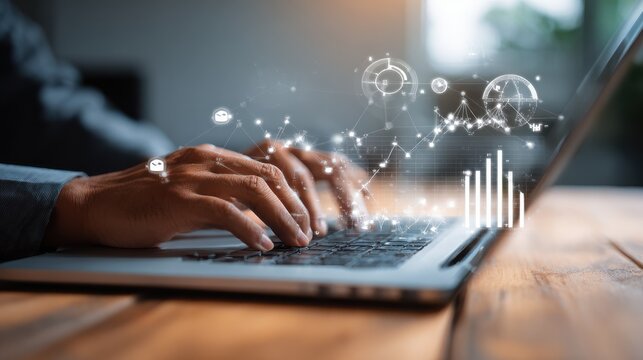 Close up of business man hand working on laptop computer with social media diagram and chart graph on wooden desk as concept, no logos, no brands - Powered by Adobe
