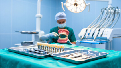 Obraz premium Dental Prosthetic Teeth and Instruments on Surgical Tray