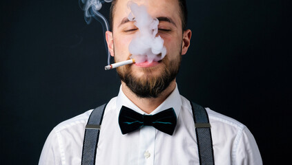 Man Smoking Cigarette, Wearing White Shirt and Bow Tie